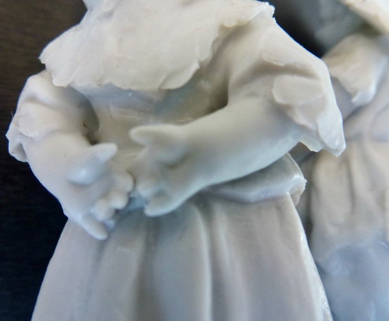 Image 1 of Luxury sponge porcelain figurine with gold leaf finish.