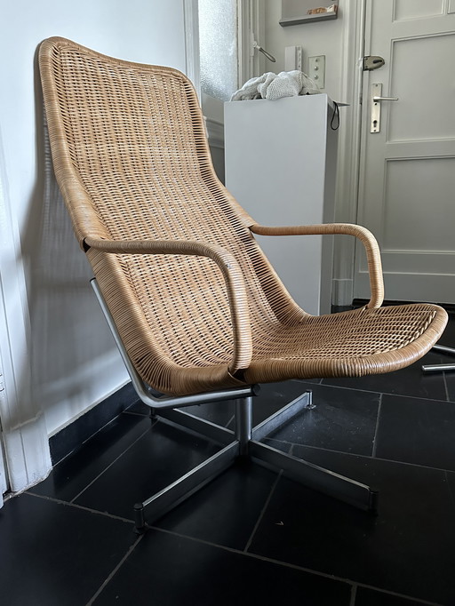 Sedia girevole Dirk Van Sliedregt in rattan