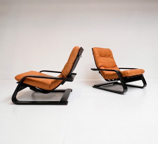 Poltrona rivestita color cognac, anni '60