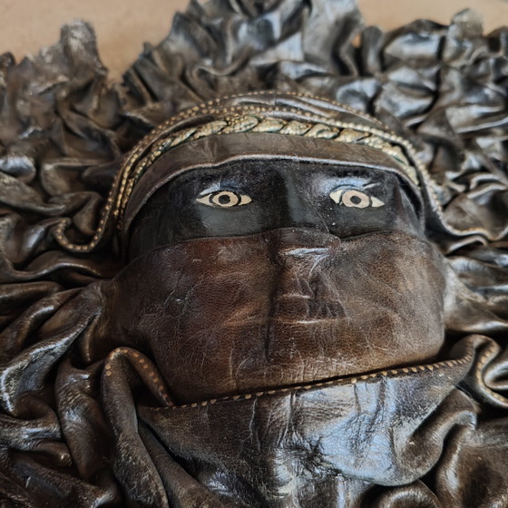 Image 1 of Handcrafted Leather Wall Sculpture 45×45 cm – Tuareg Inspired Mask Relief