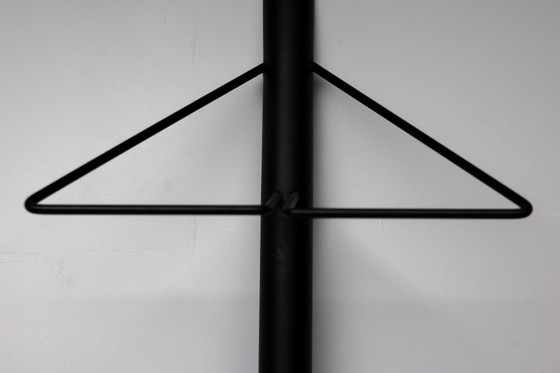 Image 1 of Modern, sleek black coat rack. Stylish and sturdy.