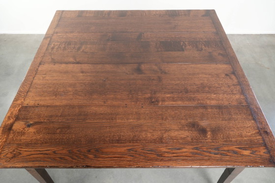 Image 1 of Oude vierkante eikenhouten eettafel uit midden 20e eeuw met 2 lades en prachtige kleuren
