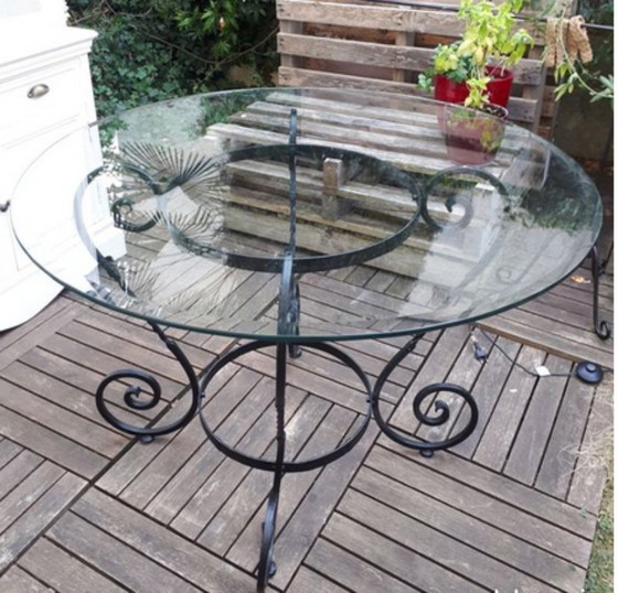 Image 1 of Mesa redonda de cristal y hierro forjado - Interior o exterior