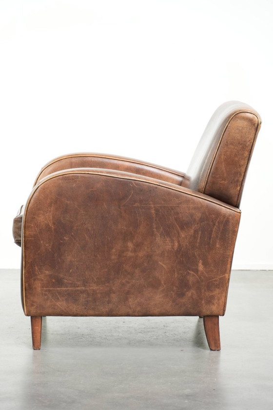 Image 1 of Sessel aus Schaffellleder mit wunderschönem, zeitlosem Design und herrlich warmen Farben