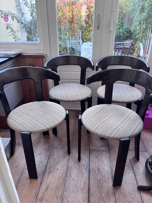 Juego de cuatro sillas de comedor de madera marrón oscuro