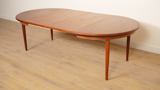 Image 1 of Table de salle à manger ronde vintage | extensible | teck | 130 - 240 cm