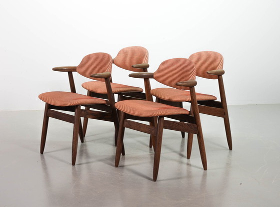 Image 1 of Authentieke Cowhorn Tijsseling eetkamerstoelen met wengé houten frame en steenrode bekleding door Hulmefa - Set van 4