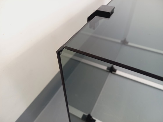 Image 1 of Vintage salontafel van gerookt glas, zwart metaal en gegoten aluminium uit de jaren 70