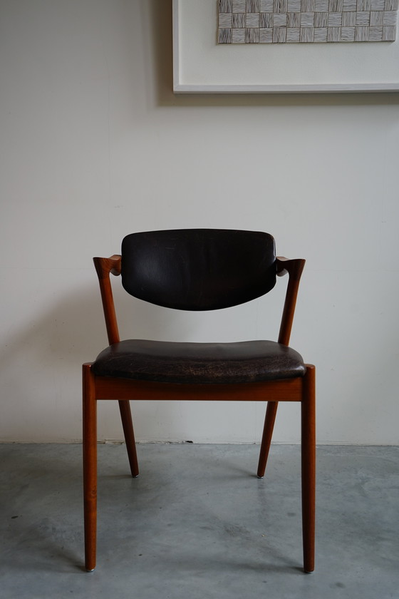 Image 1 of 6 Kai Kristiansen stoelen | Model 42 | Teak Leder patina