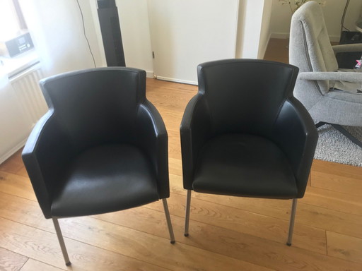 2 x dining chair with armrest, black leather, chrome base, in excellent condition, bought at Goossens, invoice lost, name