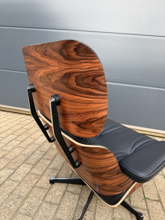 Image 1 of Sillón Eames Lounge original de Vitra + Otomana de palisandro