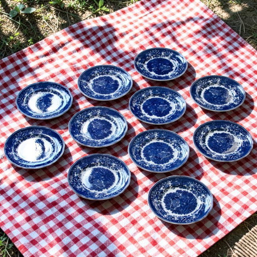 11 English plates signed Enoch Wedgwood "Avon Cottage"