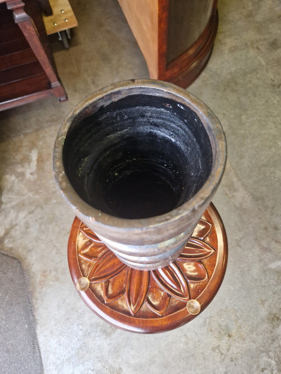 Image 1 of Hermoso jarrón de loza de color bronce.