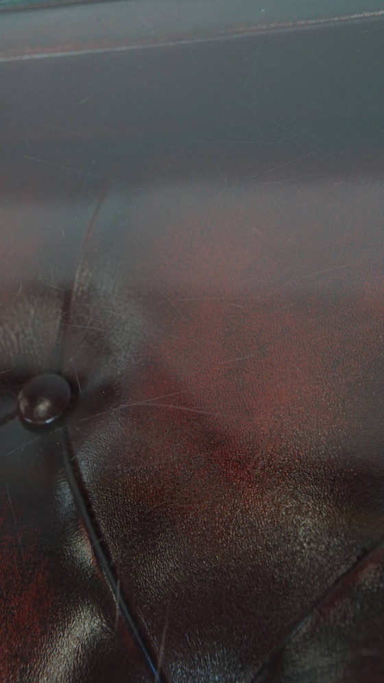 Image 1 of Beef leather chesterfield side/ coffee table in a red color with glass top