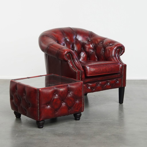 Fauteuil club chesterfield en cuir de vache rouge et table d'appoint/saloon avec plateau en verre