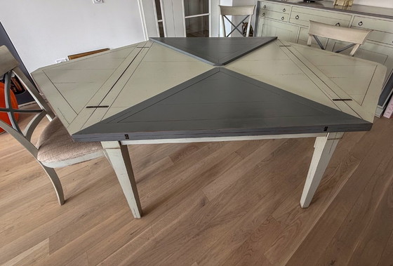 Image 1 of Handkerchief table with 4 leaves and 4 chairs