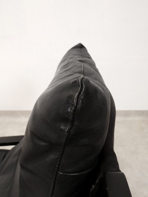 Image 1 of  high-back lounge chair in black leather