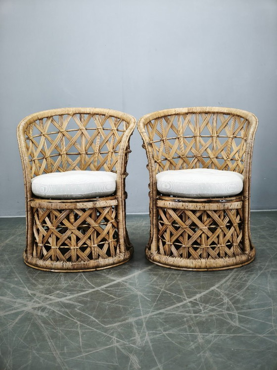 Image 1 of Een paar Italiaanse bamboe- en rotanfauteuils, jaren 60.