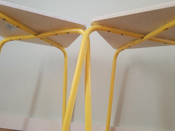Image 1 of Set of 2 50s-60s tubular frame faux leather stools in white and yellow