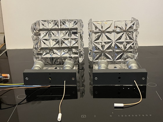 Image 1 of Een paar Kinkeldey nachtlampjes uit het midden van de 20e eeuw.