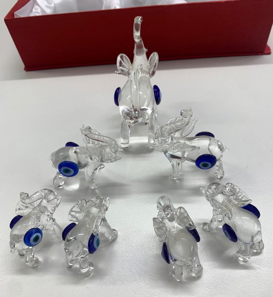 Image 1 of Famiglia di elefanti dagli occhi azzurri in confezione regalo