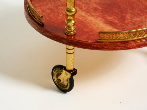 Image 1 of Round, small 1960s Aldo Tura serving or bar trolley in red goatskin leather | Made in Italy