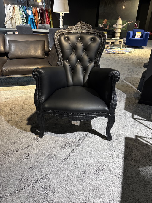 Moooi rookkleurige fauteuil