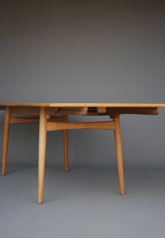 Image 1 of Table de salle à manger extensible en chêne Hans J. Wegner Modèle AT 310 par Andreas Tuck,1960s