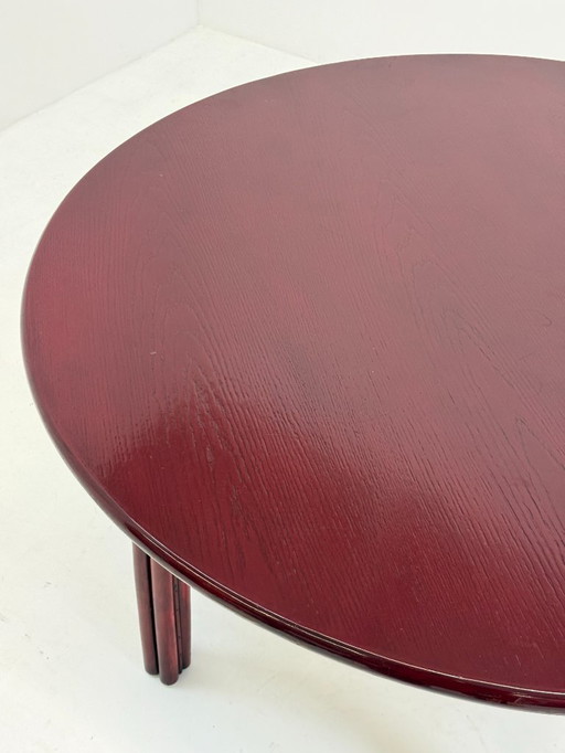 Vintage round dining table in burgundy red