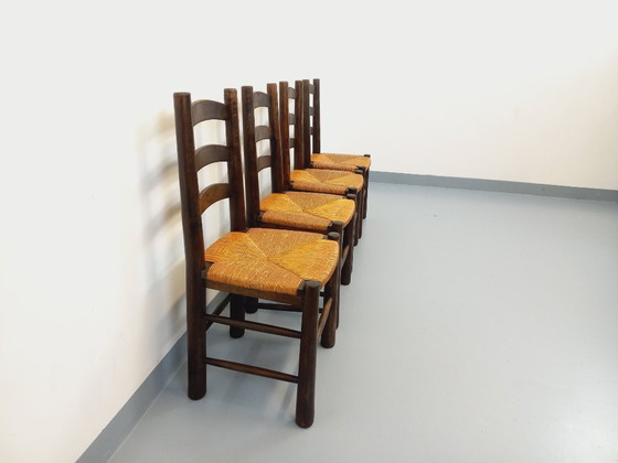 Image 1 of Set van 4 vintage brutalistische stoelen van Georges Robert, gemaakt van hout en stro, uit de jaren 50 en 60.