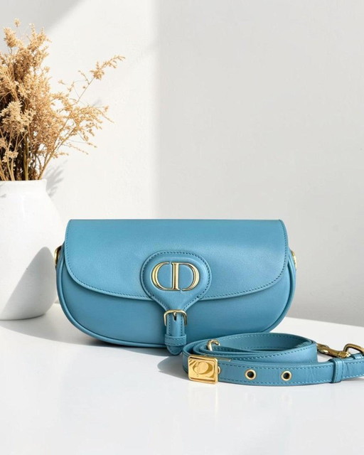 DIOR BOBBY EAST WEST - SCHOUDERTAS VAN GLAD KALFSLEER MET BLAUW-GOUDEN BESLAG