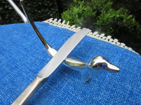 Image 1 of 4 Silver Plated Knife Rests Dachshund Dog Long Tail Blue Eyes vintage