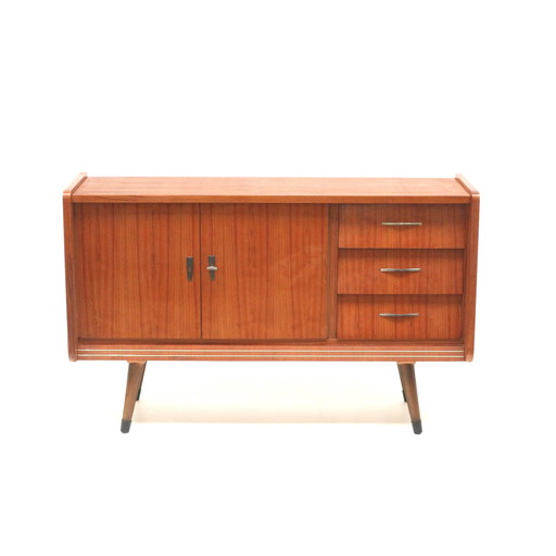Vintage dresser with drawers and doors made in the 1950s