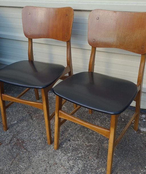 Set di 2 sedie vintage scandinave in teak e similpelle nera, prodotte da Kofod-Larsen, Danimarca, anni '60.
