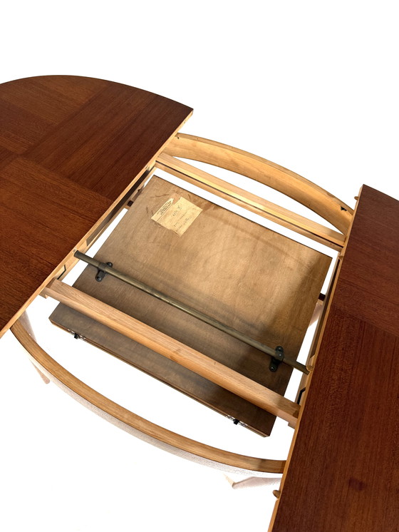 Image 1 of Vintage extendable teak dining table '60