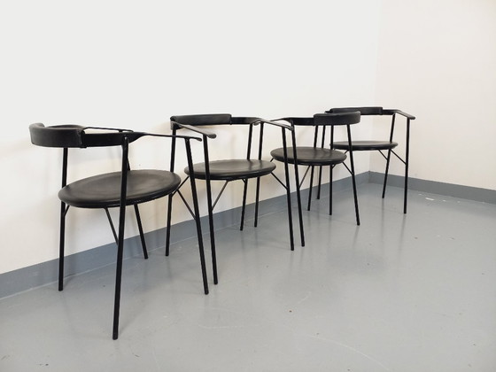 Image 1 of Set di 4 poltrone vintage di design italiano in metallo nero e similpelle nera degli anni '80