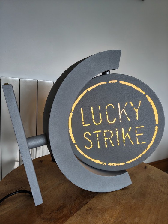 Image 1 of Vintage draaiend lichtreclamebord Lucky Strike