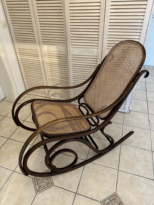 Original Thonet rocking chair model 7010 (1881-1919) with some...