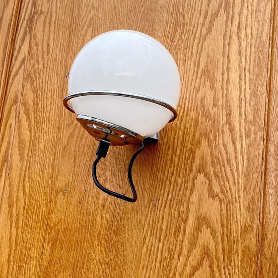 Image 1 of Targeti opaline glass globe and chrome metal wall light