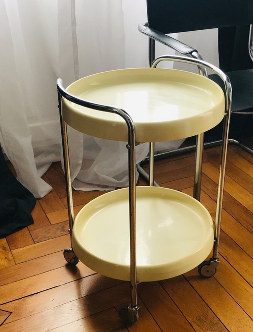 Deserte or vintage side table on castors