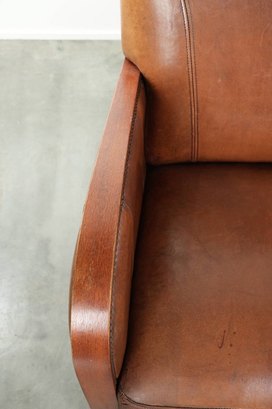 Image 1 of Beautiful sheepskin armchair in Art Deco style with wooden armrests