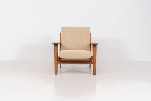 Early GE-290 lounge chair in oak by Hans J. Wegner for Getama (Denmark, 1953).