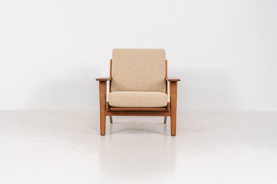 Image 1 of Vroege GE-290 loungestoel in eikenhout van Hans J. Wegner voor Getama (Denemarken, 1953).