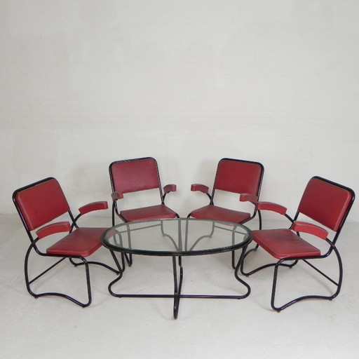 Conjunto de 4 sillones y mesa de centro con estructura tubular de estilo Bauhaus, década de 1950.