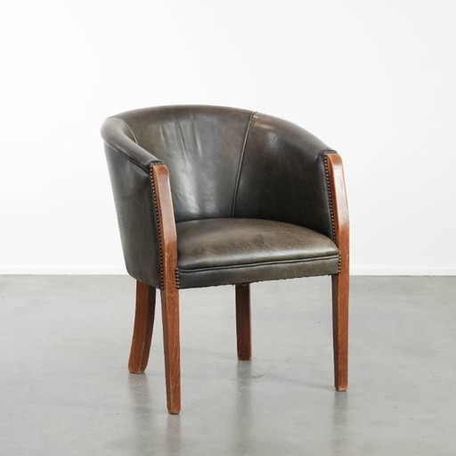 Sedia a vasca/sedia laterale in pelle di mucca e legno con una bellissima combinazione di colori