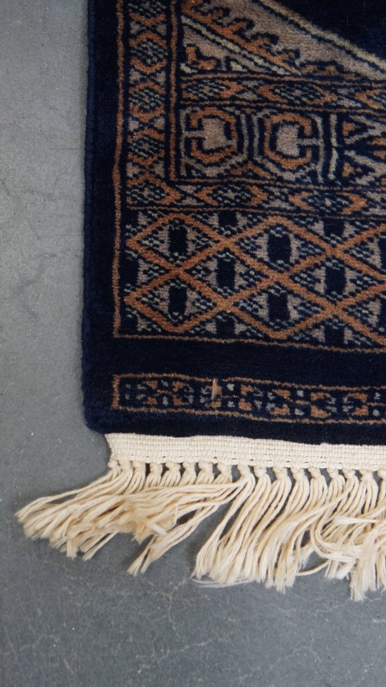 Image 1 of Loper/ vloerkleed in oosterse stijl in voornamelijk blauw tinten 148x40cm