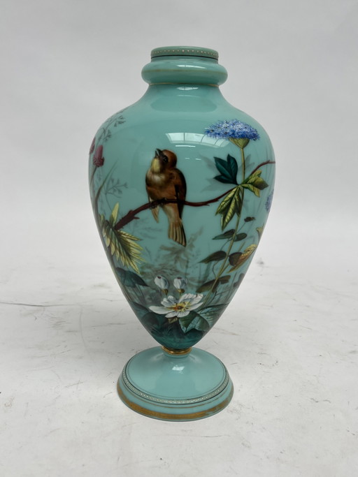Two unique vases with a bird scene