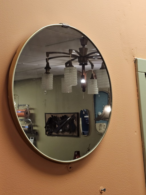 Miroir mural vintage en laiton doré