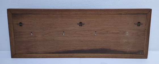 Image 1 of Appendiabiti da parete a specchio in rovere