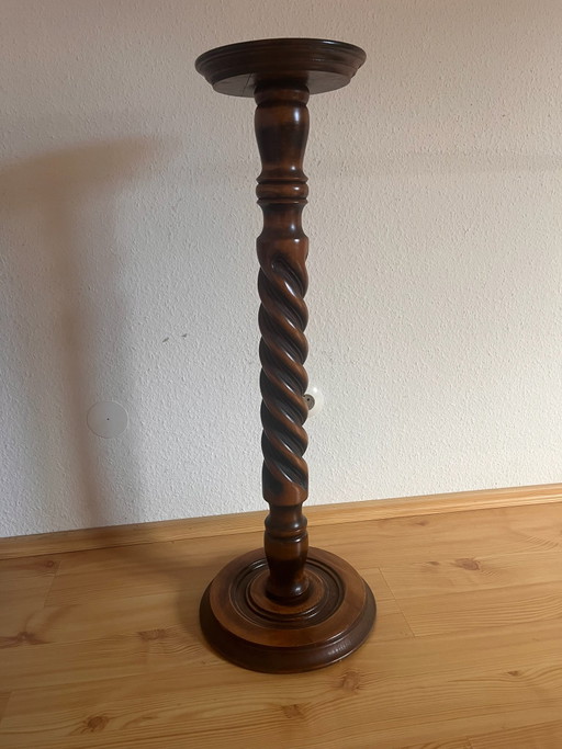 Soporte para plantas retorcido